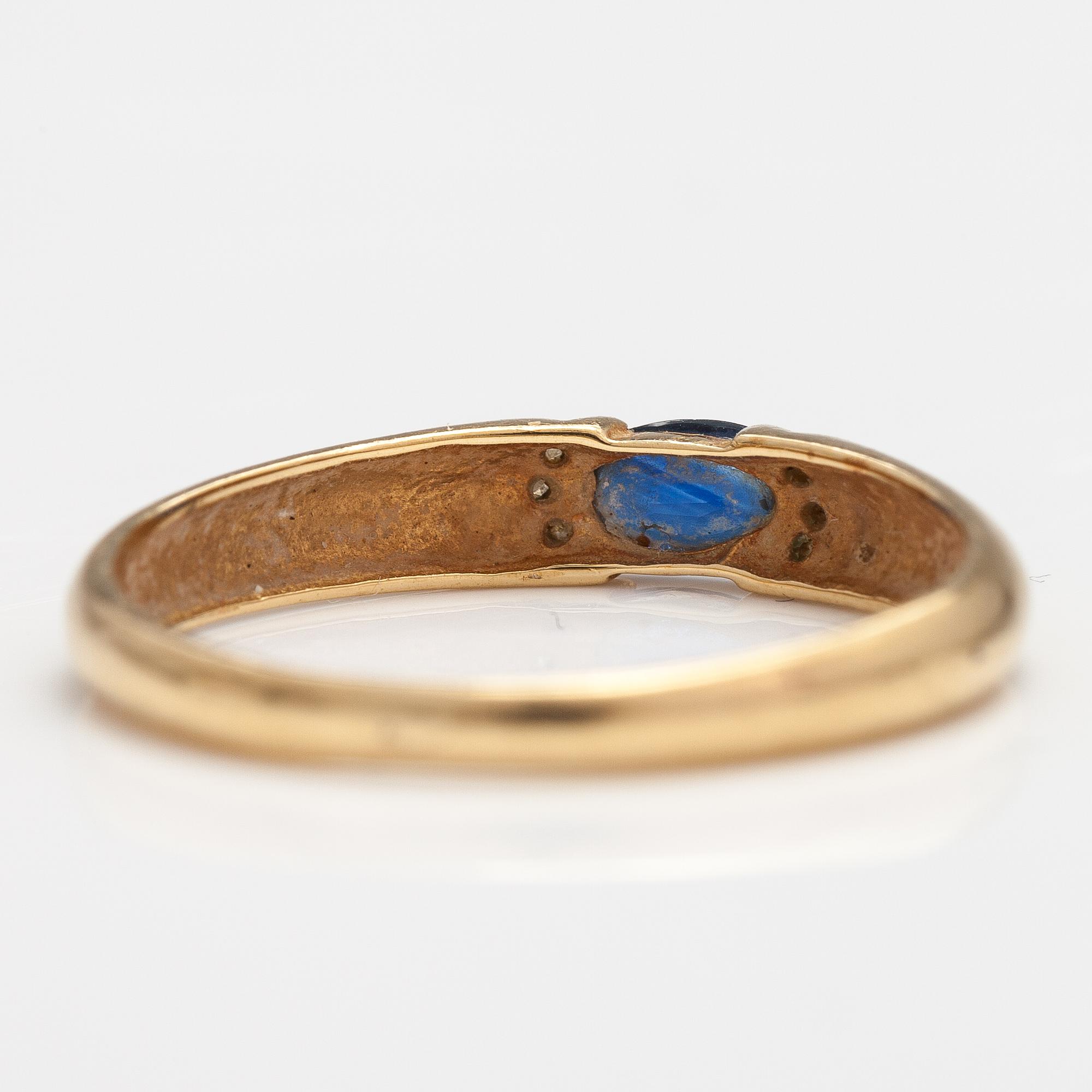 SORMUS, 14K kultaa, safiiri, timantteja n. 0.015 ct yht. Kultakeskus, Hämeenlinna 1999.