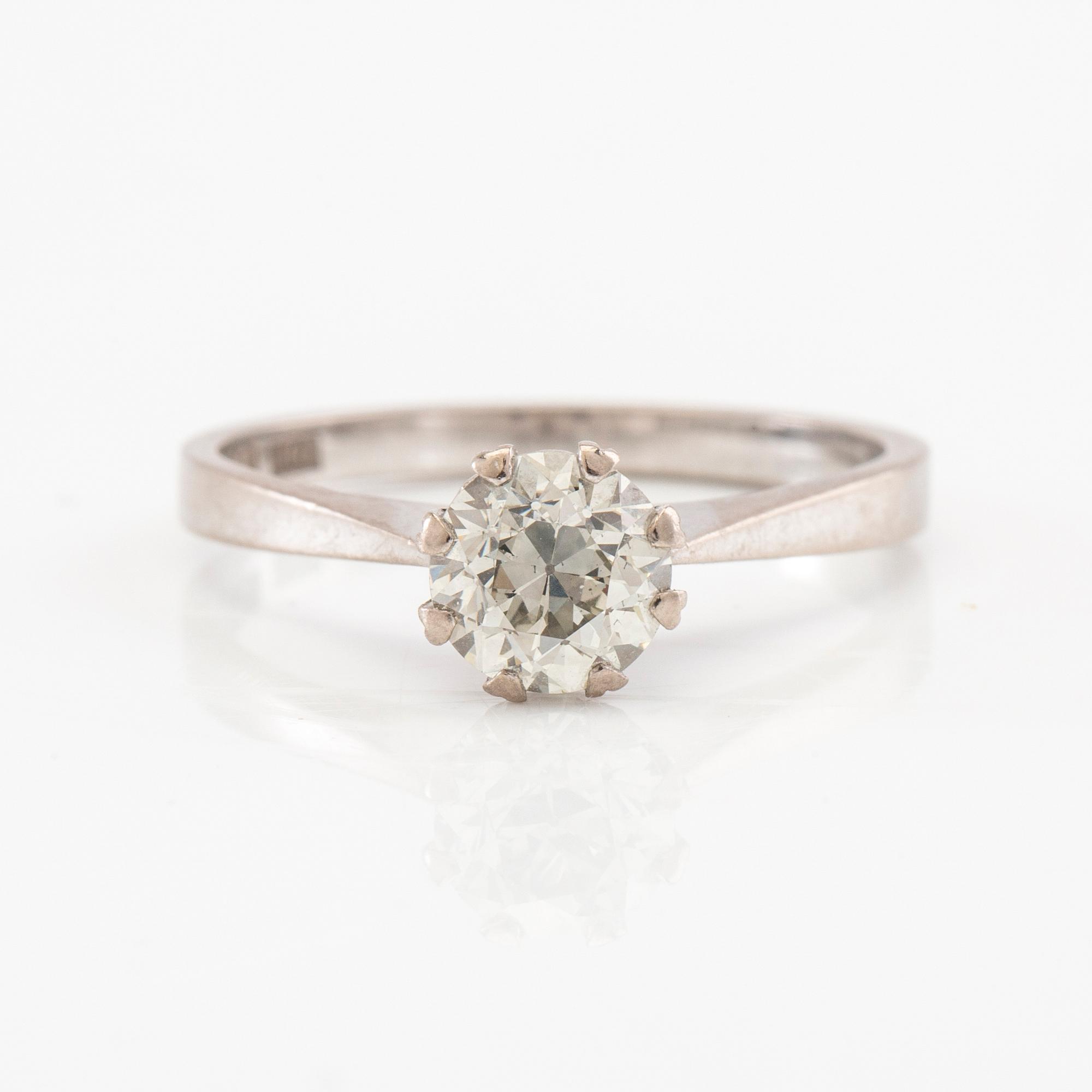 Solitaire ring in 18K white gold with a Very Faint Light Green diamond approximately 1.10 ct.