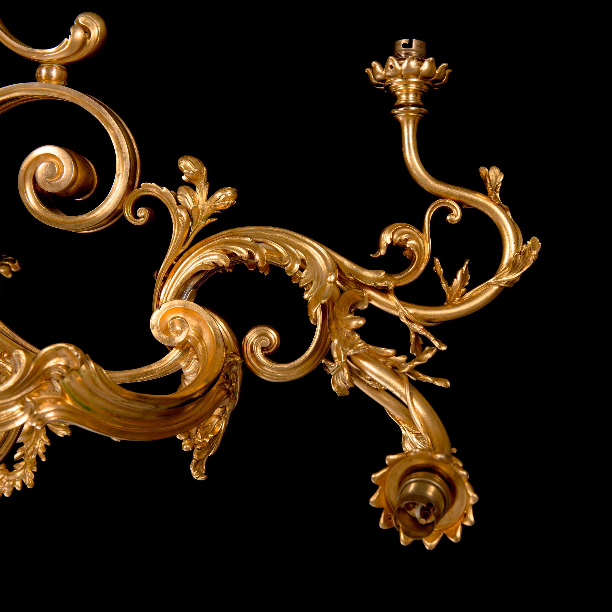 Ferdinand Barbedienne, A signed and gilded bronze chandelier from second half of the 19th century. Height 115 cm.