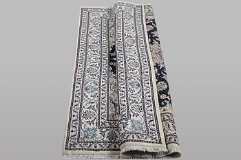 A rug, Nain, part silk, ca 198 x 144 cm.