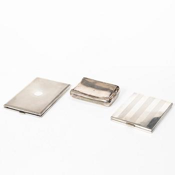 Two cigarette cases and a snuffbox, silver, Sweden and Swedish import marks respectively.
