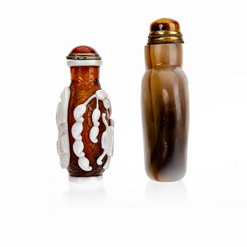 A set of two Chinese 20th century glass and agate snuff bottles.