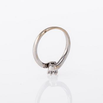RING, 18K vitguld, ca 0,25 ct. Vikt 3,5 g.