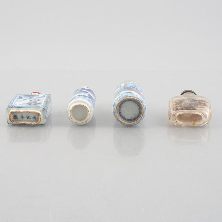 A group of nine Chinese glass and porcelain snuffbottles, 20th century.