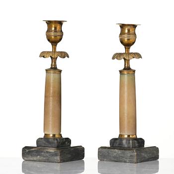 A pair of late Gustavian gilt brass and marble candlesticks, Stockholm, late 18th century.