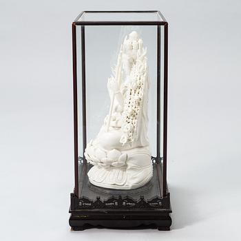 An oriental Buddha statue in porcelain.