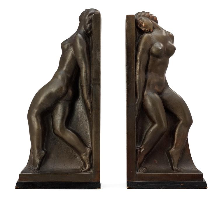 A pair of Axel Gute patinated bronze bookends, Sweden 1920's.