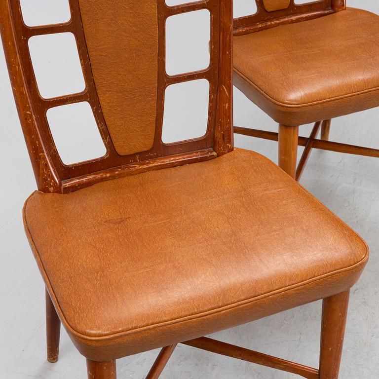 Three beech and mahogany chairs, mid 20th Century.