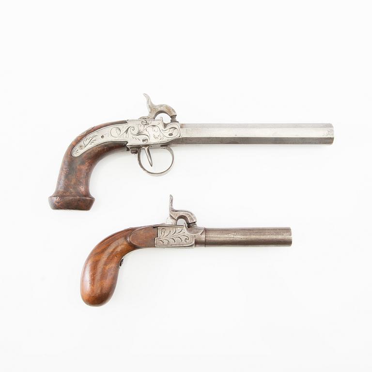 Pocket pistols two pieces, percussion lock, first half / mid 19th century.