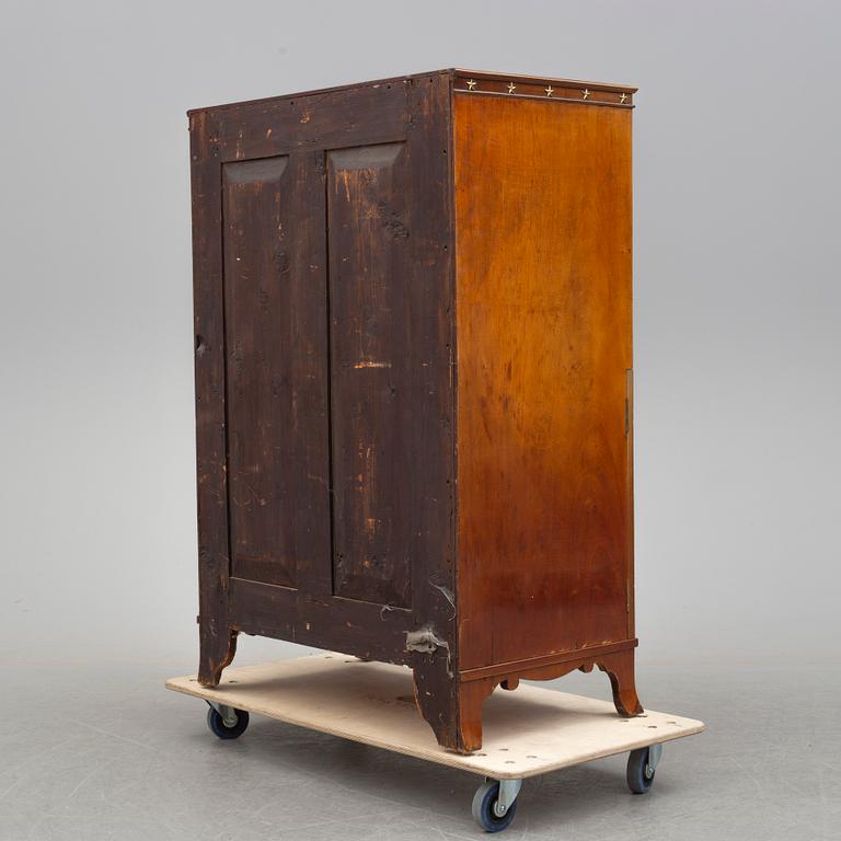 A northern european empire chiffonier, first half of the 19th century.