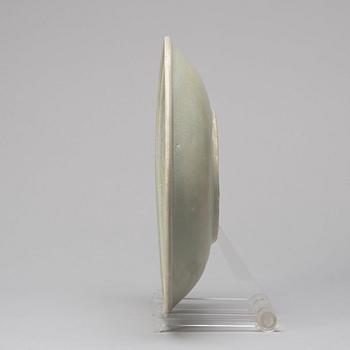 A celadon glazed dish, Thailand, Sawankhalok, 16/17th Century.