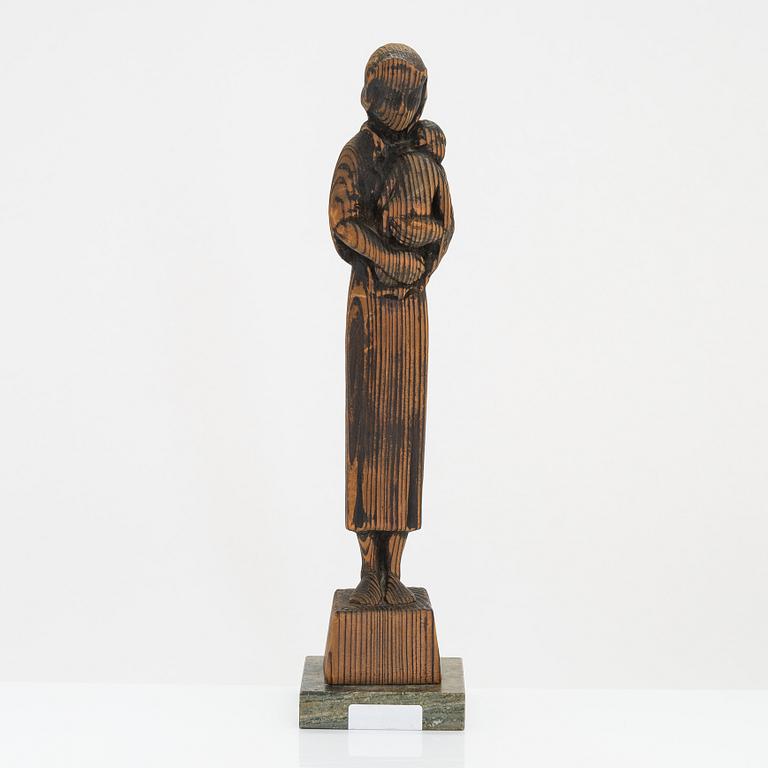 Gunnar Uotila, a wooden sculpture, signed and dated 1943.