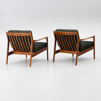 Folke Ohlsson, a pair of 'USA 75' armchairs, Dux, Sweden, 1960's.