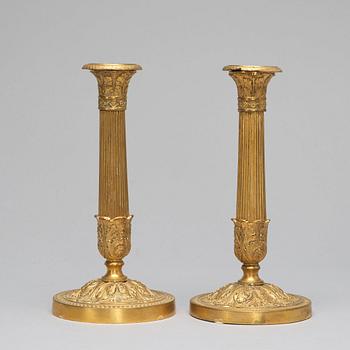 A pair of French Empire-style late 19th ct candlesticks.