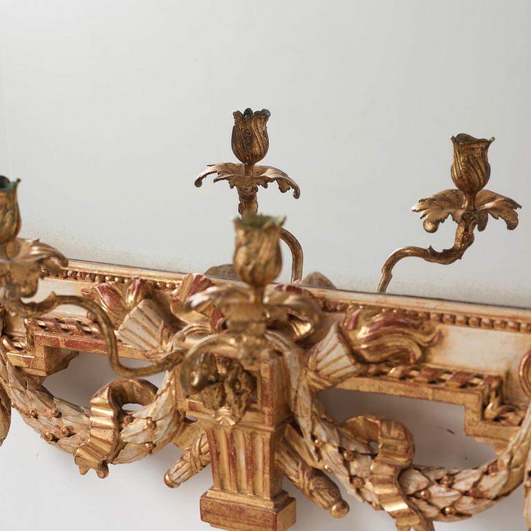A Gustavian late 18th century two-light girandole mirror.
