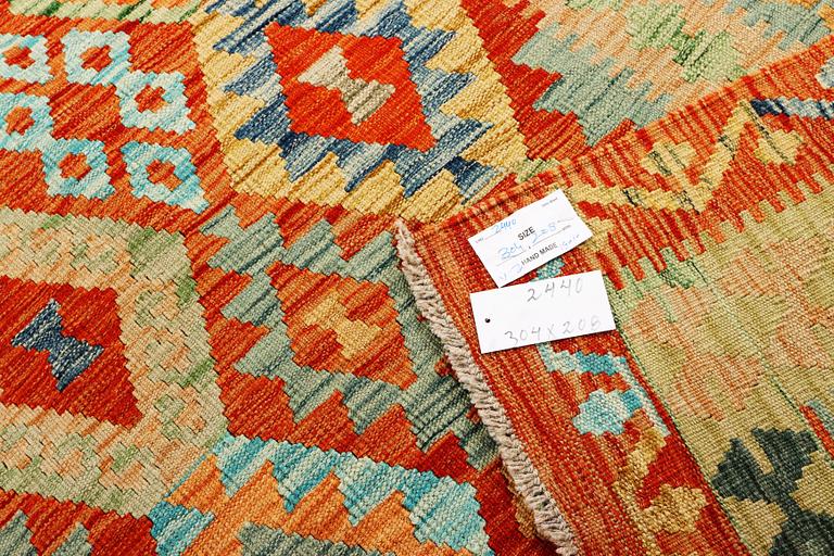 A Kilim carpet, ca. 304 x 208 cm.