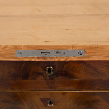 A mid 19th century writing desk and chair.