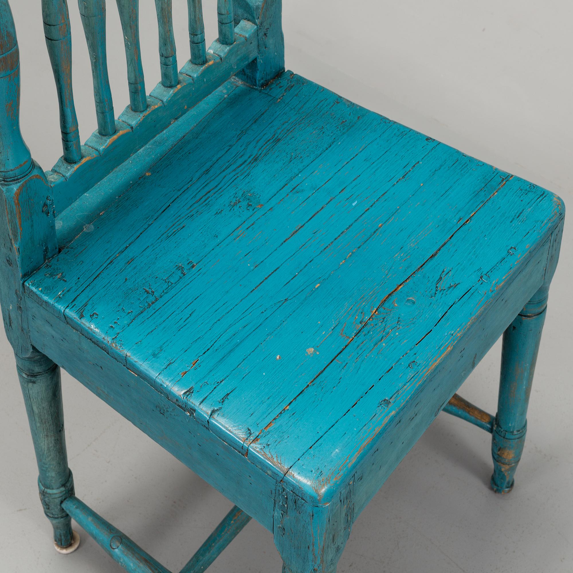 A set of four 19th century folk art chairs.