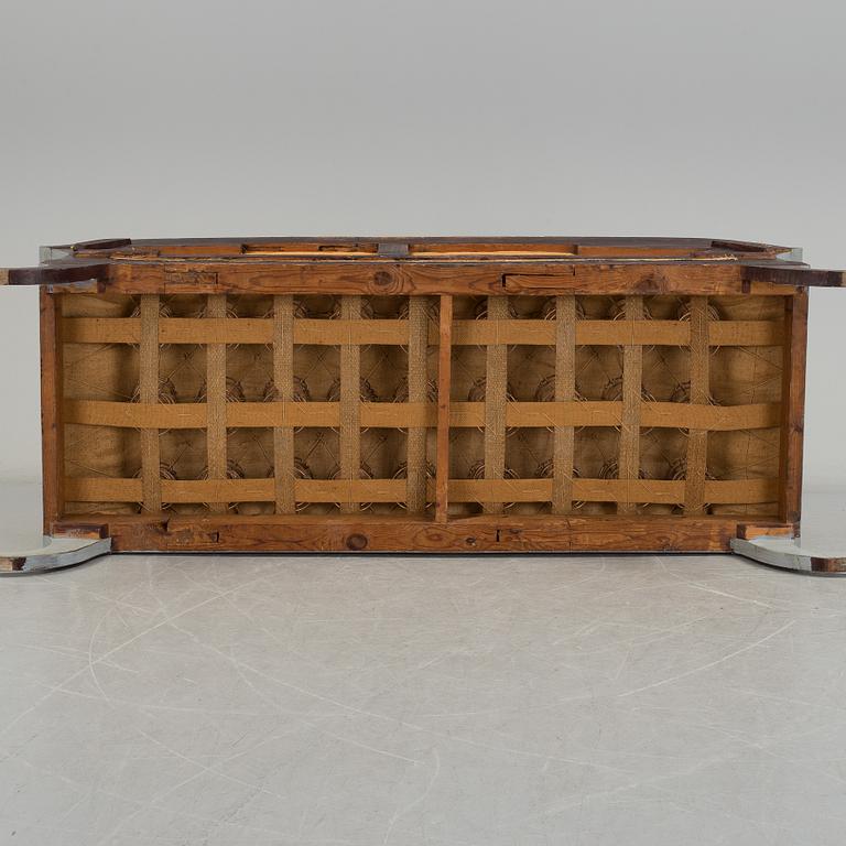A mid 19th century painted sofa.