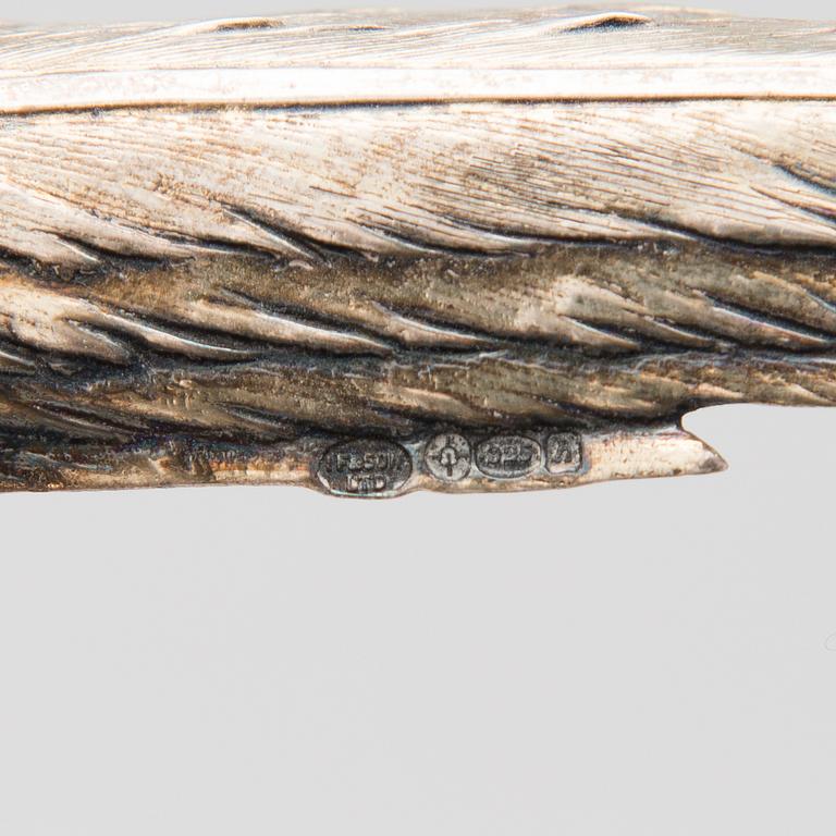 Two bird table decorations in silver, German and British hallmarks.