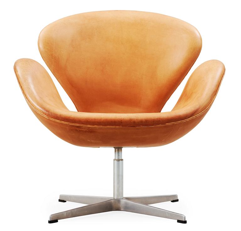 An Arne Jacobsen leather 'Swan' chair, Fritz Hansen, Denmark 1993.