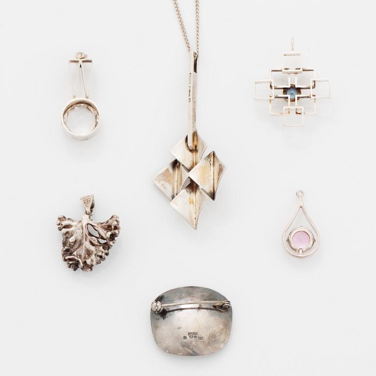 Five pendants and one brooch, silver.