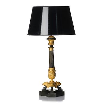 307. A French Louis Philippe ormolu and patinated bronze lamp, first part 19th century.