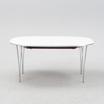 A 'Super elliptical' dining table by Bruno Mathsson & Piet Hein, from around the year 2000.