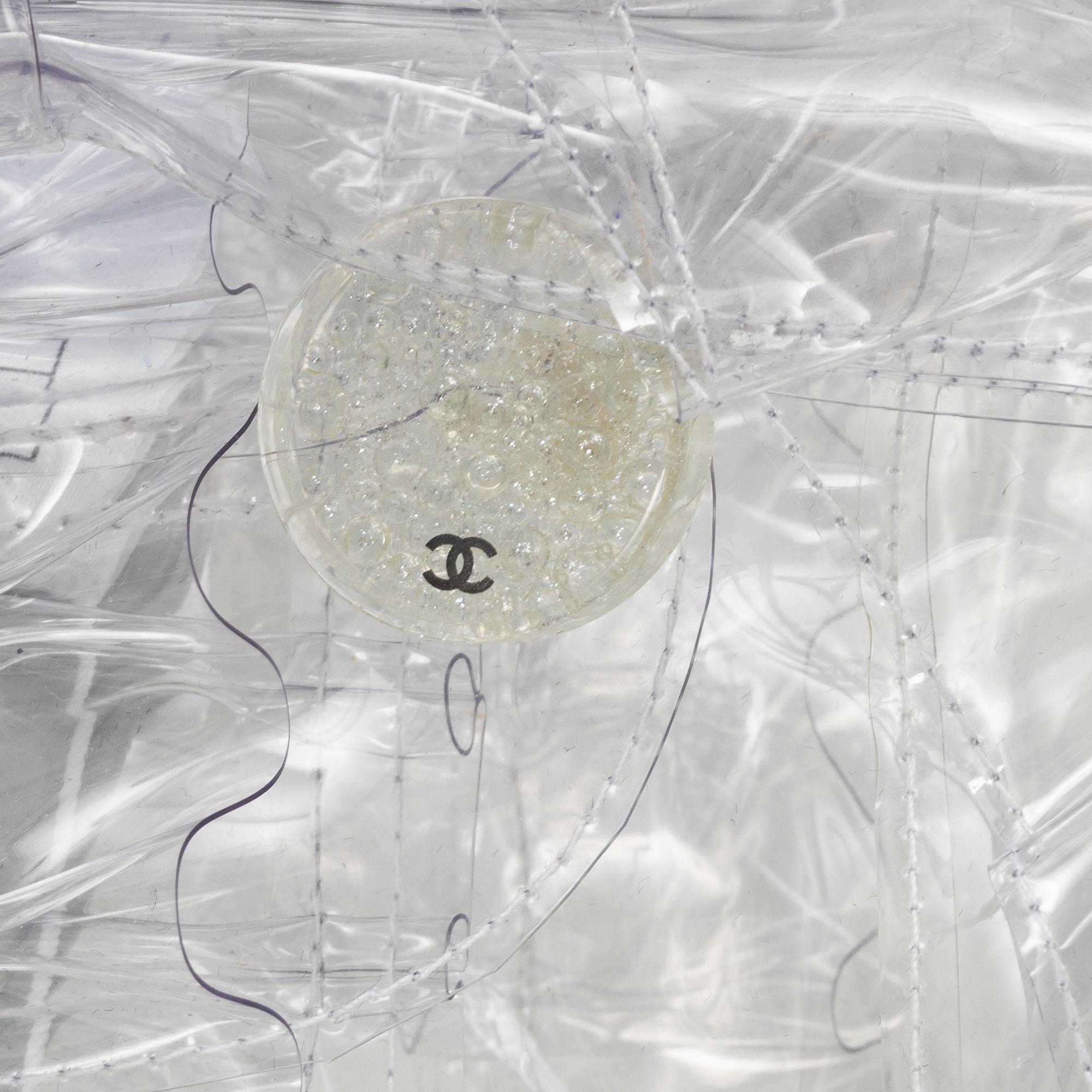 Chanel, a raincape, size S.