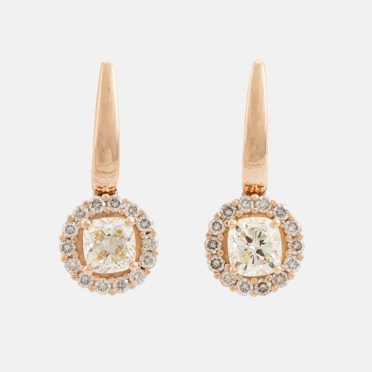 Cushion cut diamond earrings.