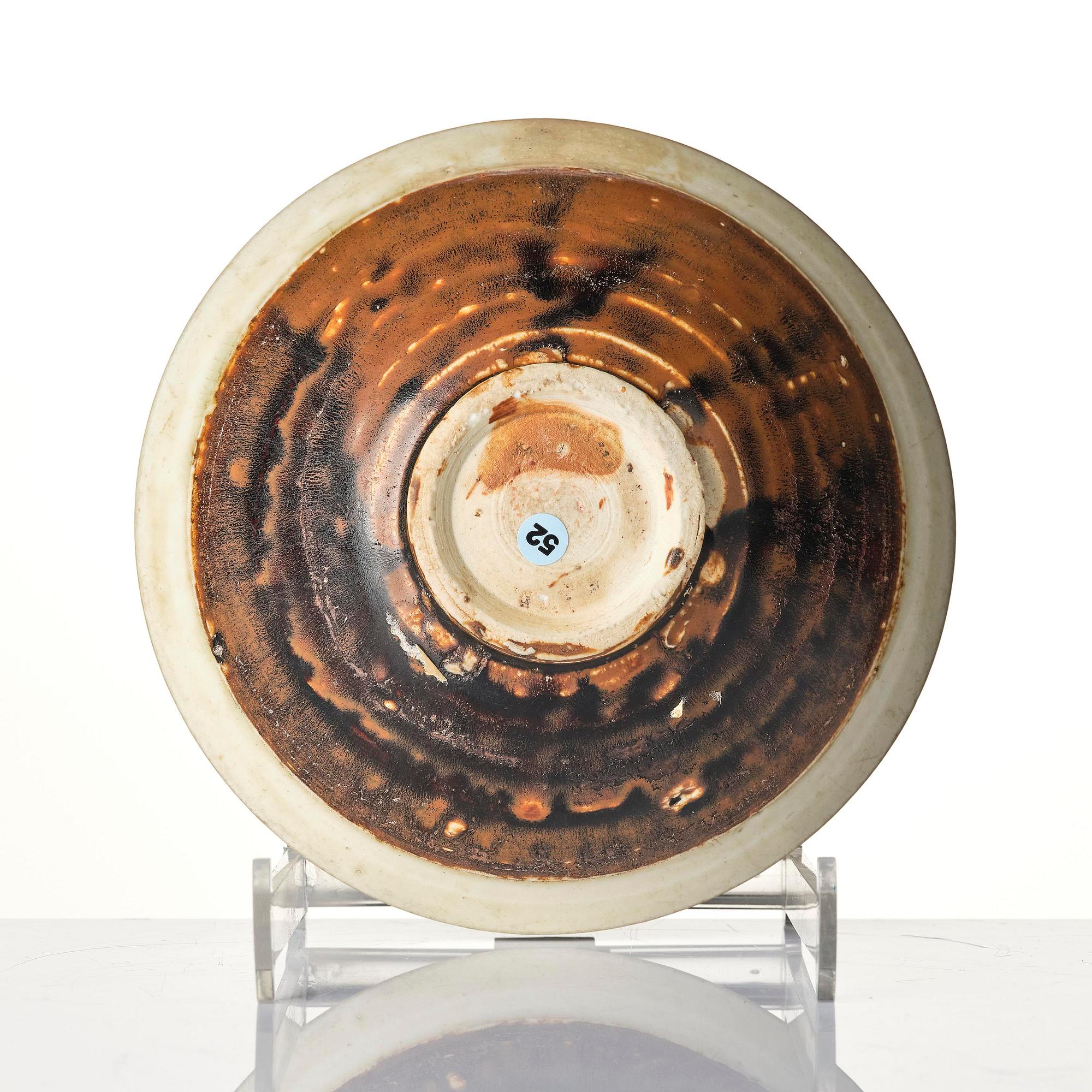 A brown and white glazed bowl, Song dynasty (960-1279).