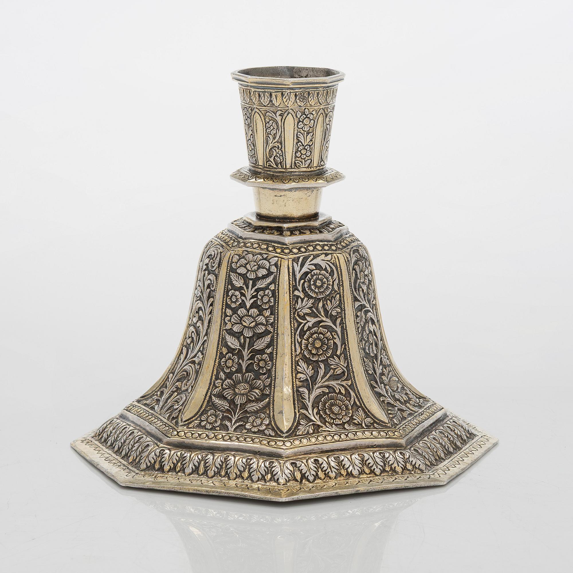 A parcel-gilt silver repoussé water pipe huqqa base, 18th/19th Century.