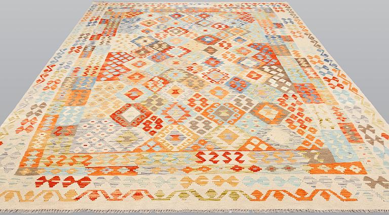 A kilim carpet, ca 350 x 258 cm.