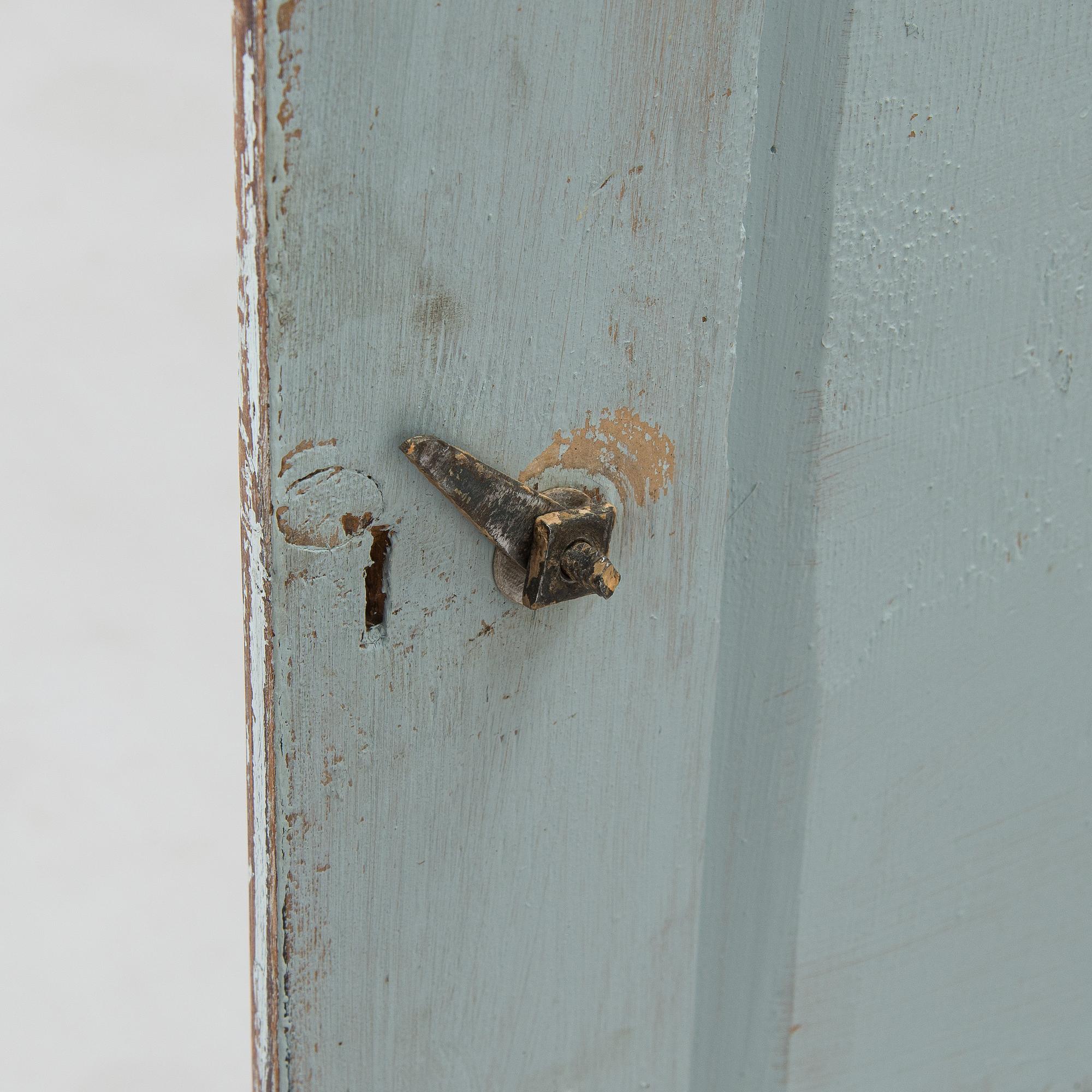 A painted cabinet, circa 1900.