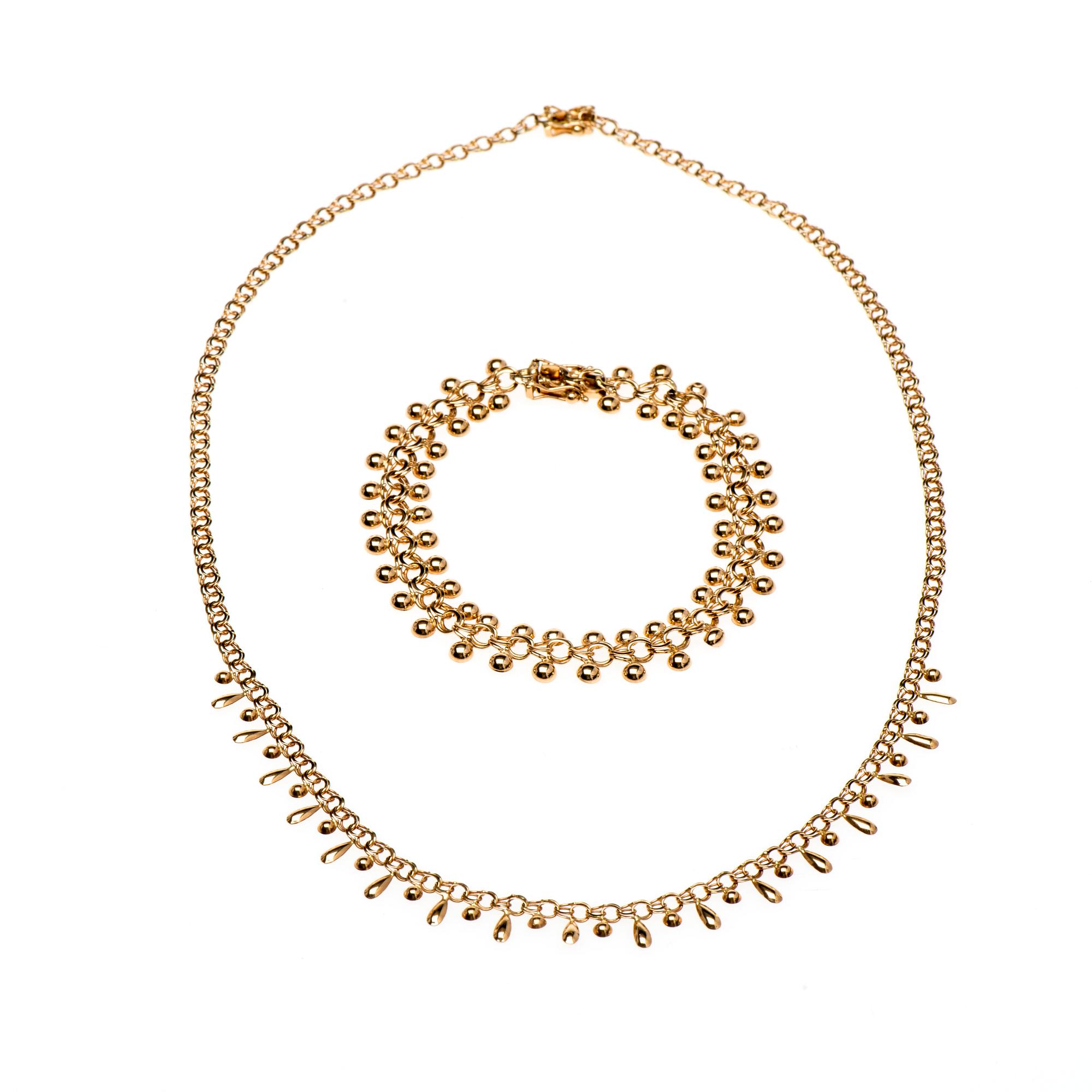 HALSKED och ARMKED, 14K guld. Finska kontrollsstämplar. Vikt totalt ca 11,6 g.