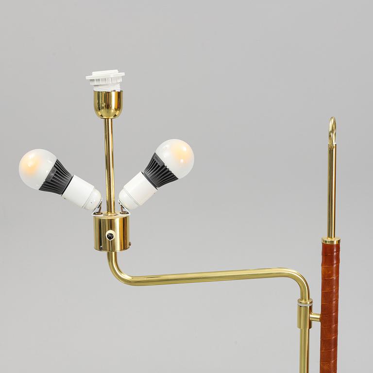 A pair of brass and leather floor lights, Örsjö industri, 21st century.