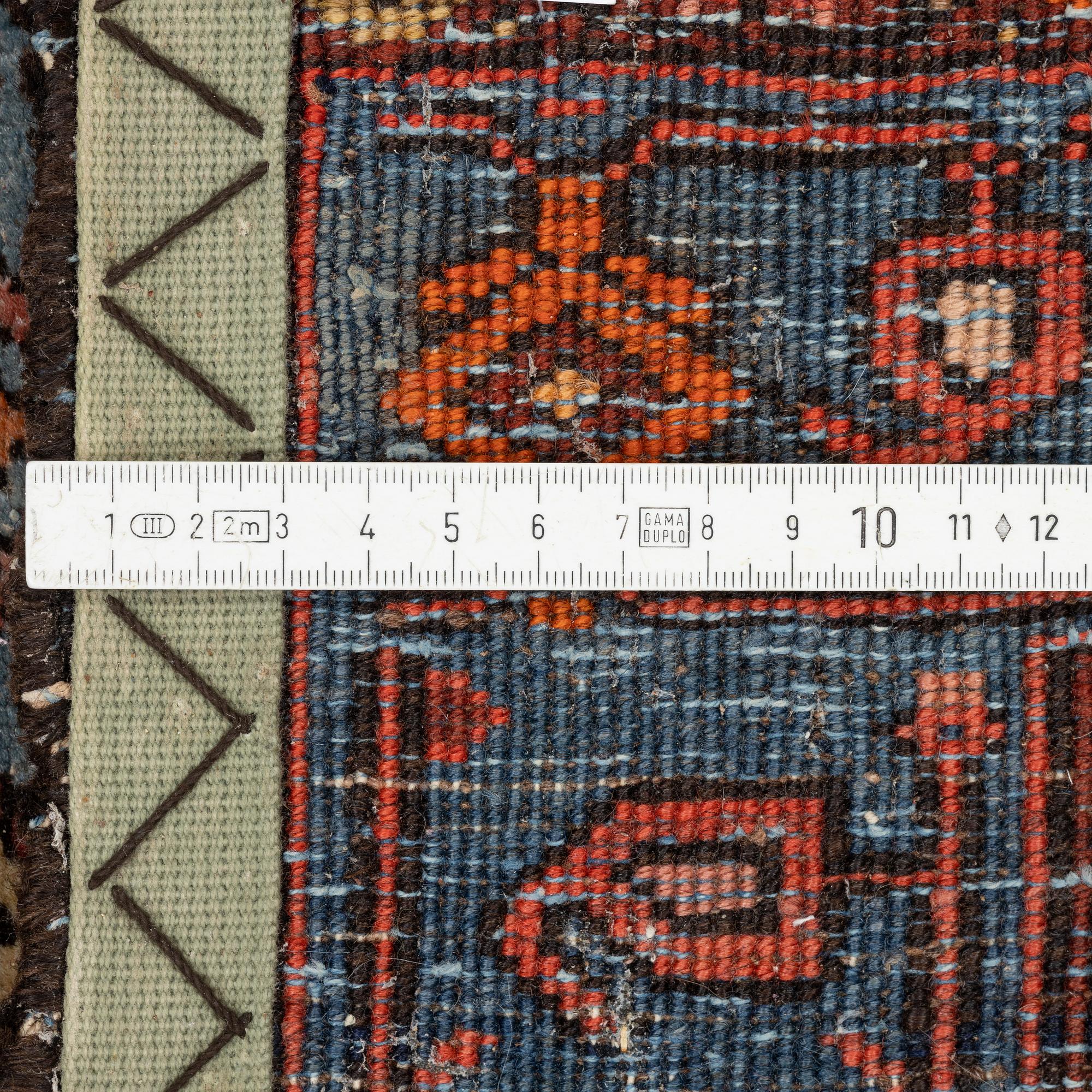 A carpet, semi-antique Hamadan, c. 199 x 128 cm.