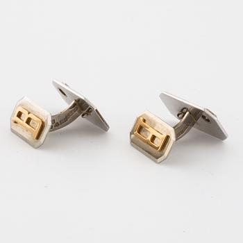 A pair of brilliant cut diamond cufflink by Gustav Dahlgren & Co, Malmö, 1945.