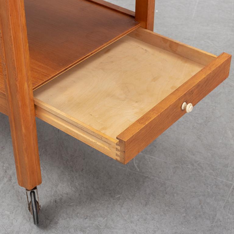 A 1930s/1940s elm veneered trolley.
