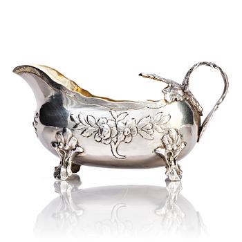 257. A Swedish mid- 18th century parcel-gilt silver cream-jug, mark of Anders Schotte, Uddevalla 1779.