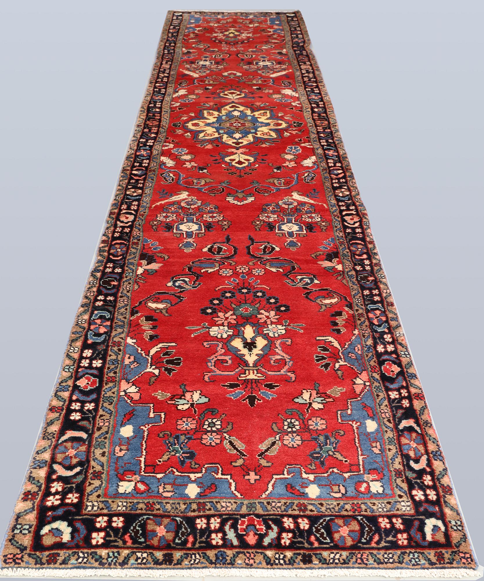 A Figural Hamadan runner carpet, 515 x 90 cm.