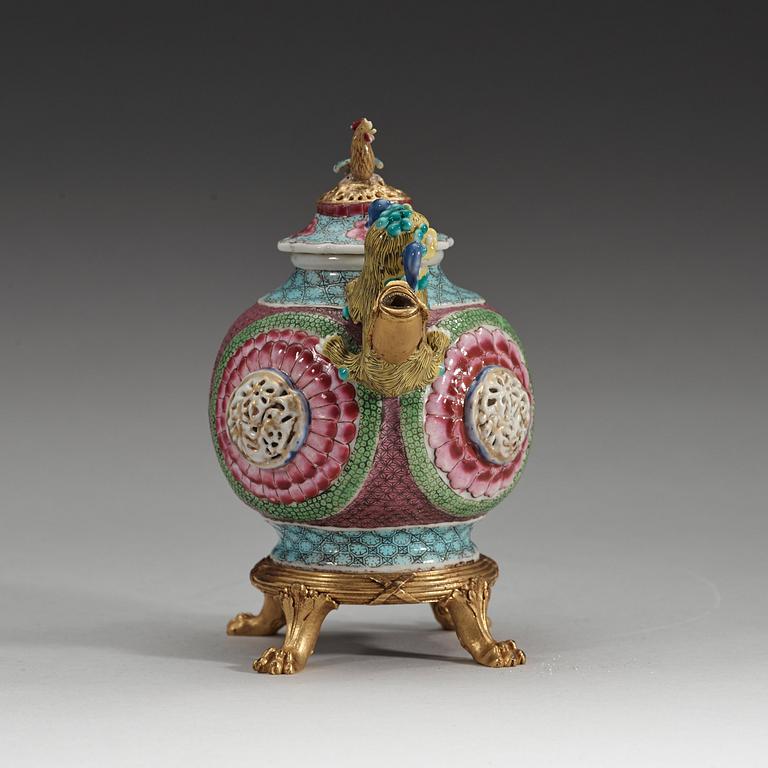 A gilt bronze mounted famille rose tea pot with cover, Qing dynasty, Yongzheng (1723-35).