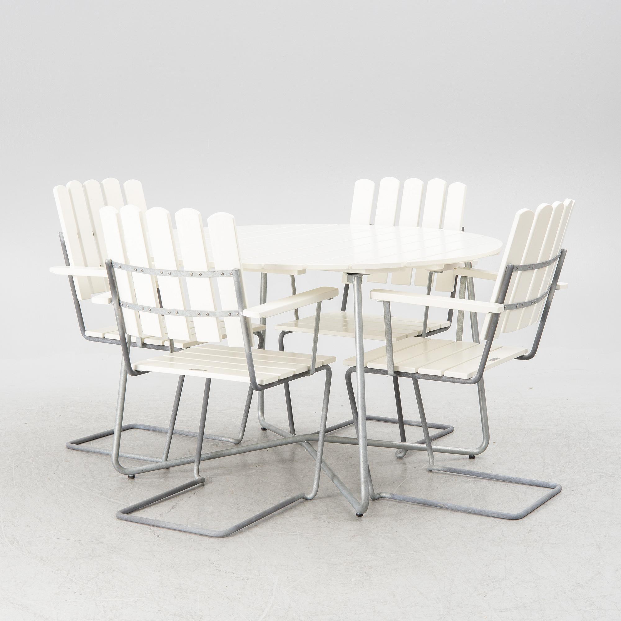 Arthur Lindquist, four armchairs model A2 and a table 9A, Grythyttan's steel furniture.