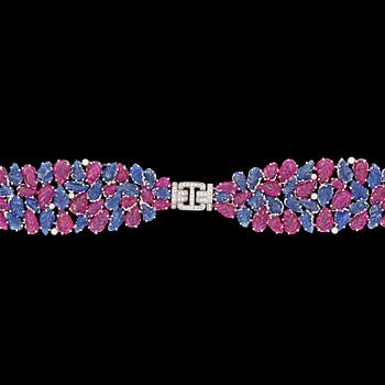 A ruby and sapphire Art deco style bracelet, brilliant cut diamond, tot. app. 0.90 cts.