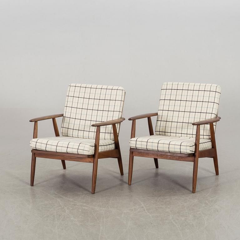 A pair of second half of the 20th century armchairs.