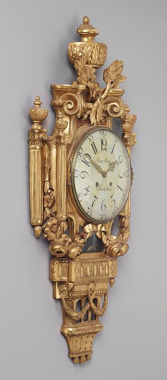 A Gustavian wall clock by Claes Berg, master 1762.