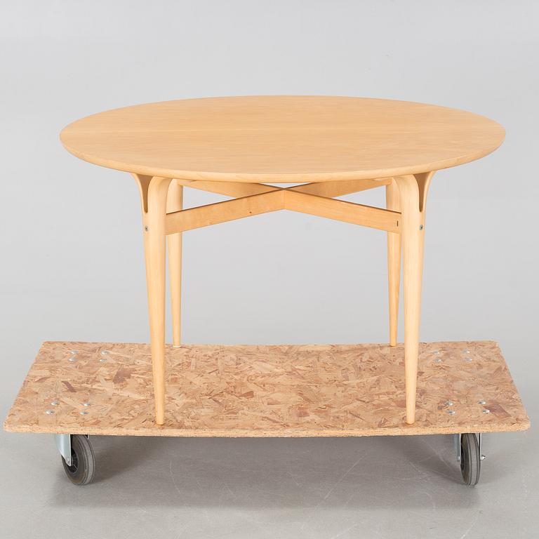 a coffee table from Firma Karl Mathsson, Värnamo, dated 1986.