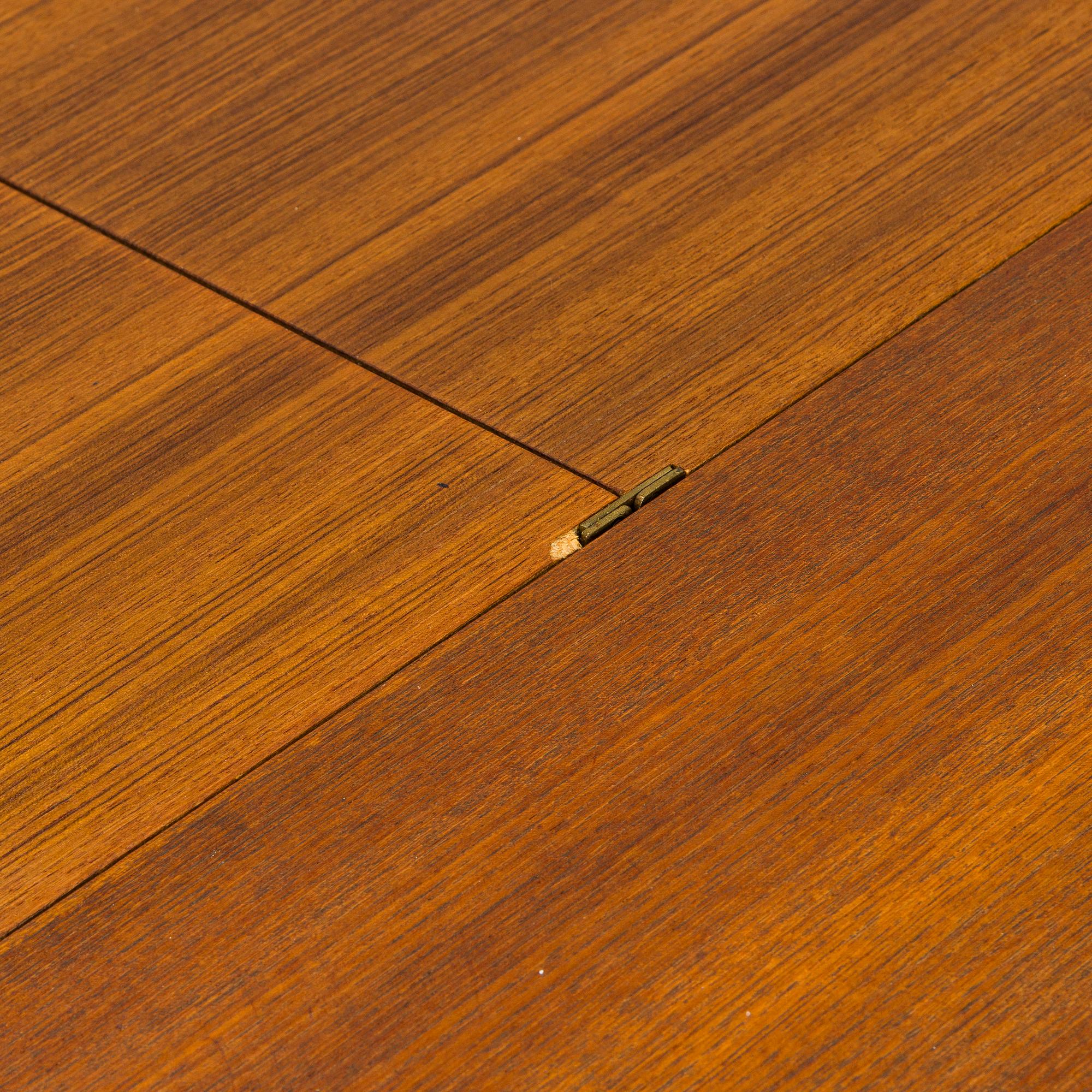 A mid-20th century dining table.