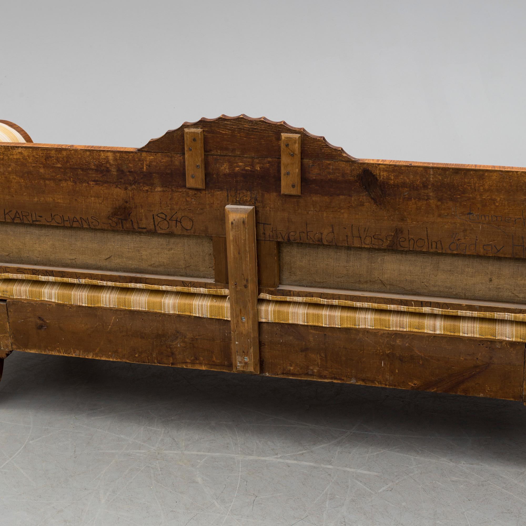 A mahogany sofa dated 1840.