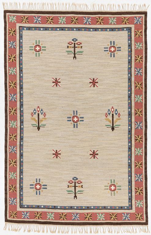 A flat weave carpet, c 304 x 200 cm.